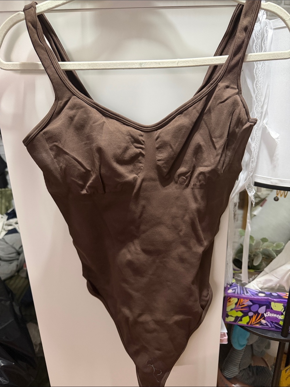 TWO Sleeveless Ribbed Bodysuits